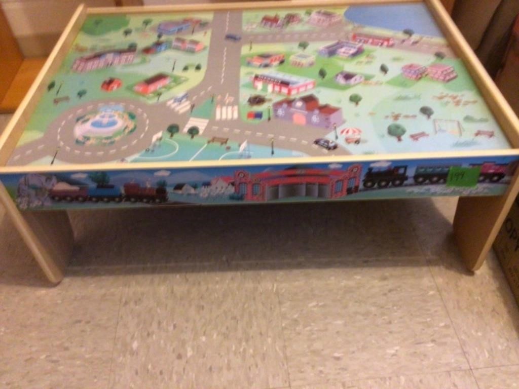 kids play table and 2 boxes of books