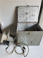 Vintage skillsaw and storage box
