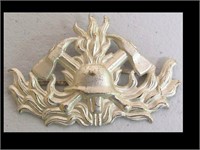 ALUMINUM FIREMAN'S HAT BADGE