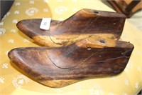 Pair of early timber shoe moulds,