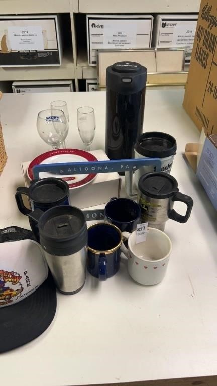 Assorted mugs, cups, glasses, and thermos