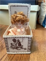 Porcelain Doll in a Box