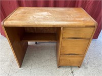 Vintage wooden student’s desk. Three drawers.