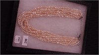 An eight-strand freshwater pearl necklace,