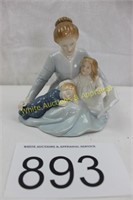 Avon "A Mothers Touch" Porcelain Figurine