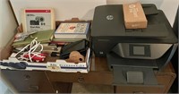 Flat of office supplies and HP printer