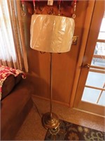 Brass floor lamp.