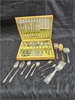 Vintage group of silver-plated flatware with a