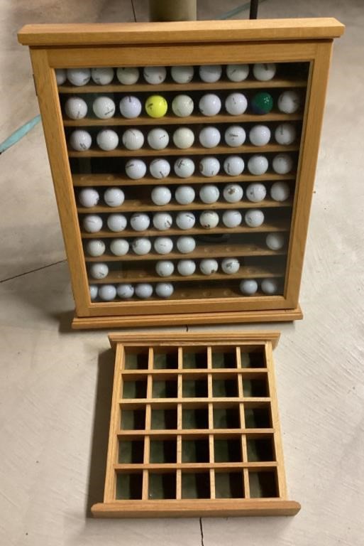 Collection of golf balls & 2 display cabinets