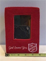 E5)  Salvation Army mirror, God Loves You