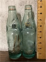 2 early glass bottles