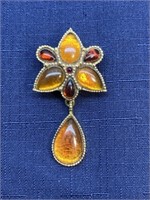 Vintage brooch Brown and amber colored stone