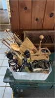 Small tub of kitchen, gadgets, wooden spoons,