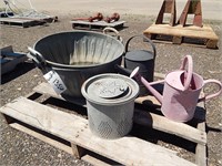 2 Galvanized bushel baskets, 2 watering cans and a