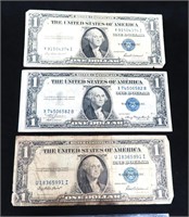 Three (3) 1935 $1 Silver Certificates. Blue Seal