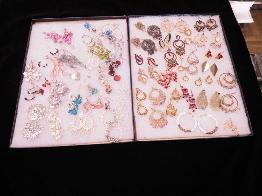 Two trays of pierced earrings including
