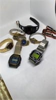 Group of digital and analog watches