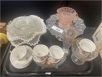 Cut glass, tea cups and saucers.