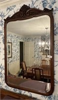 Antique walnut-framed wall mirror 30x48