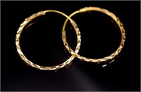 Pair of 22ct gold diamond cut hoop earrings