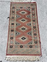 48” x 24” Area Carpet. Some damage on side-see
