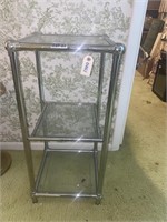 Silver tone and tempered glass shelf