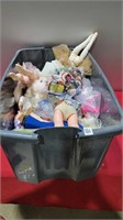 Tote full of dolls and more