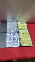 2 books of pokemon cards