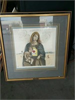 Picture of a woman with child on her lap