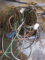 Collection of various wire, air hose, belts, etc.