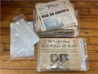 Stack of old news papers and bags