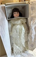new Porcelain doll in wedding dress