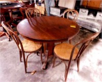 Round Table/4 Cane Bottom Chairs
