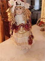 Porcelain doll very nice 23 inches tall.