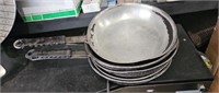 Five fry pans poor condition