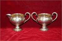 Pair of Sterling weighted creamer and sugar