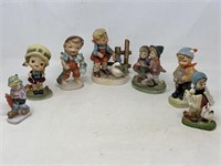 Assortment of figurines, little girl and duck