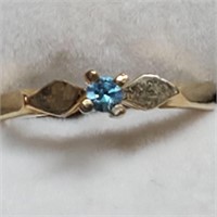 $800 10K Blue Topaz Ring