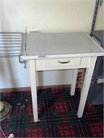 Enamel top table with drawer