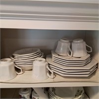 White, 4 piece place setting dishes. See picture.