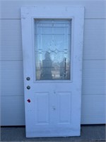 White door with decorative window