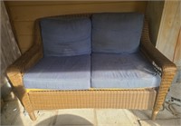 Outdoor Brown Wicker Sofa w/ Blue Cushions