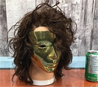 Head prop with brass face mask