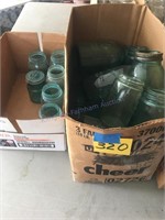 Two boxes blue canning jars