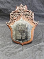 Antique carved walnut presentation plack with a