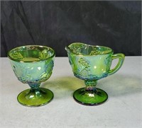 Green carnival glass cream and sugar