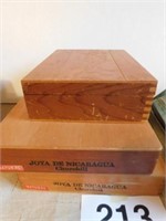 Wooden dovetail box with plant carved on lid,