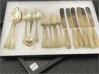 Matched Set of Sterling Silver Flatware-