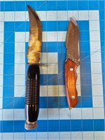 Hunting knives with leather sheaths