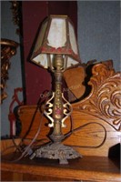 Early 20th century art metal lamp with slag glass